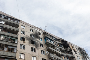 A building seen damaged and burnt-out following a Russian drone strike.