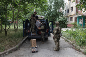 The Ukrainian police unit ‘White Angels’ evacuates civilians from the city under constant threat of Russian FPV drones.