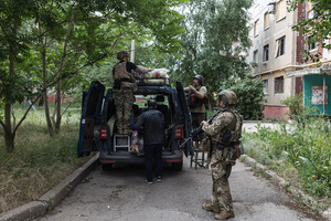 The Ukrainian police unit ‘White Angels’ evacuates civilians from the city under constant threat of Russian FPV drones.