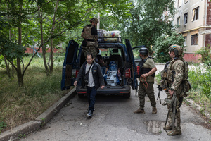 The Ukrainian police unit ‘White Angels’ evacuates civilians from the city under constant threat of Russian FPV drones.