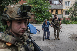 The Ukrainian police unit ‘White Angels’ evacuates civilians from the city under constant threat of Russian FPV drones.