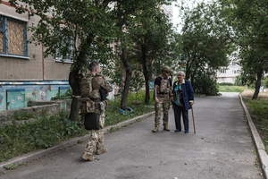 The Ukrainian police unit ‘White Angels’ seen evacuating civilians from the city under the constant threat of Russian FPV drones.
