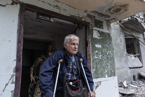 A man seen being evacuated by the ‘White Angels’ police unit.