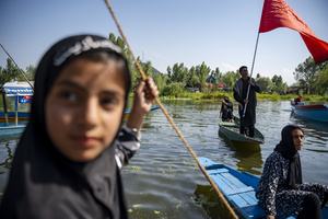 Kashmiri Shia Muslims aboard traditional boats participate in a Muharram boat procession on Dal Lake, commemorating the martyrdom of Imam Hussain and his companions in the Battle of Karbala. Muharram is the first month of the Islamic calendar. Shia Muslims observe Muharram as a period of mourning to commemorate the martyrdom of Imam Hussain, the grandson of Prophet Muhammad. Imam Hussain was martyred on the 10th day of Muharram, during the historic Battle of Karbala in 680 CE.