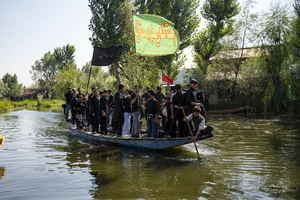 Kashmiri Shia Muslims recite nohas (elegiac poems) aboard traditional boats during a Muharram procession on Dal Lake, commemorating the martyrdom of Imam Hussain and his companions in the Battle of Karbala. Muharram is the first month of the Islamic calendar. Shia Muslims observe Muharram as a period of mourning to commemorate the martyrdom of Imam Hussain, the grandson of Prophet Muhammad. Imam Hussain was martyred on the 10th day of Muharram, during the historic Battle of Karbala in 680 CE.