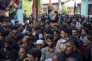 Shia Muslims walk in a Muharram procession while reciting nohas, elegiac poems mourning the martyrdom of Imam Hussain and his companions in the Battle of Karbala. The recitations form an integral part of Muharram commemorations observed by Shia communities worldwide. Muharram is the first month of the Islamic calendar. Shia Muslims observe Muharram as a period of mourning to commemorate the martyrdom of Imam Hussain, the grandson of Prophet Muhammad. Imam Hussain was martyred on the 10th day of Muharram, during the historic Battle of Karbala in 680 CE.