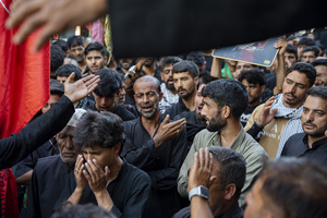 Shia Muslims recite marsiyas and weep during a Muharram mourning procession commemorating the martyrdom of Imam Hussain and his companions in the Battle of Karbala. The elegiac recitations are a central part of Muharram observances, expressing grief and remembrance of the tragedy of Karbala. Muharram is the first month of the Islamic calendar. Shia Muslims observe Muharram as a period of mourning to commemorate the martyrdom of Imam Hussain, the grandson of Prophet Muhammad. Imam Hussain was martyred on the 10th day of Muharram, during the historic Battle of Karbala in 680 CE.