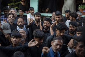 Shia Muslims recite marsiyas and weep during a Muharram mourning procession commemorating the martyrdom of Imam Hussain and his companions in the Battle of Karbala. The elegiac recitations are a central part of Muharram observances, expressing grief and remembrance of the tragedy of Karbala. Muharram is the first month of the Islamic calendar. Shia Muslims observe Muharram as a period of mourning to commemorate the martyrdom of Imam Hussain, the grandson of Prophet Muhammad. Imam Hussain was martyred on the 10th day of Muharram, during the historic Battle of Karbala in 680 CE.