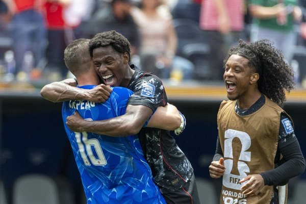 Canada' players celebrate after winning against South Africa during the FIFA World Cup Round of 32 soccer match. Final score; Canada 1:0 South Africa