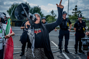 Pro-Palestinian protestor chants slogans through a megaphone during a rally outside Elbit Systems weapons factory. Pro-Palestinian protestors gathered outside Elbit Systems factory in Filton, Bristol to accuse the arms company of supplying Israel with weaponry and drones for its war in Gaza.
