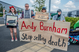 Pro-Palestinian protestors hold placards calling on the UK's new prime minister Andy Burnham to stop arms manufacturer Elbit Systems dealing arms to Israel. Pro-Palestinian protestors gathered outside Elbit Systems factory in Filton, Bristol to accuse the arms company of supplying Israel with weaponry and drones for its war in Gaza.