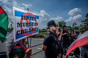 Police Officers guard the Elbit Systems factory during the rally. Pro-Palestinian protestors gathered outside Elbit Systems factory in Filton, Bristol to accuse the arms company of supplying Israel with weaponry and drones for its war in Gaza.