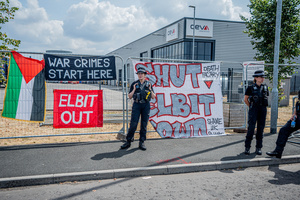 Police Officers guard the Elbit Systems factory during the rally. Pro-Palestinian protestors gathered outside Elbit Systems factory in Filton, Bristol to accuse the arms company of supplying Israel with weaponry and drones for its war in Gaza.