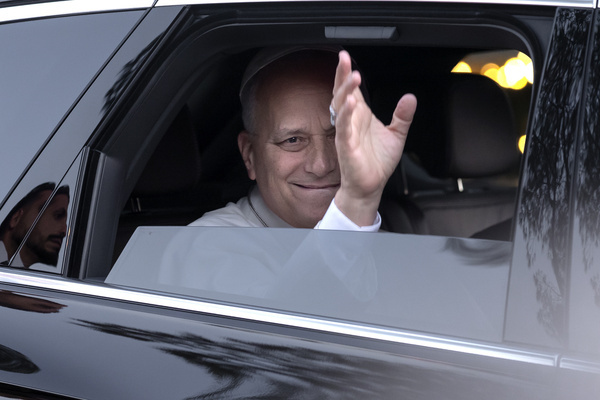 Pope Leo XIV waves as he leaves Castel Gandolfo, his summer residence to return to the Vatican.