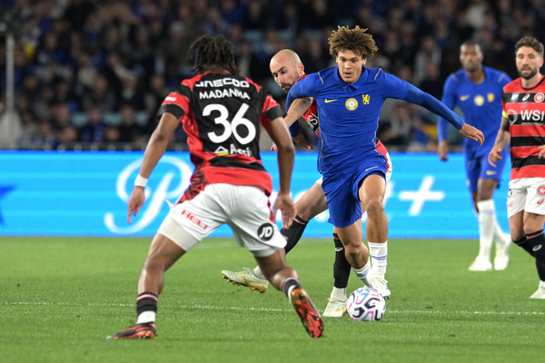 Landon Emenalo (C) of Chelsea FC, Panashe Madahna (L) and Angus Thurgate (back) of Western Sydney Wanderers FC seen in action during the 2026 Sydney Super Cup match between Chelsea FC and Western Sydney Wanderers FC held at the Accor Stadium. Final score; Chelsea FC 6:4 Western Sydney Wanderers.