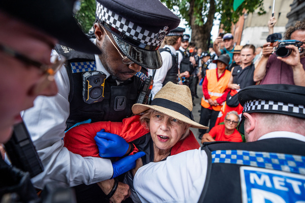 A supporter of Palestine Action is arrested by Police outside Westminster Magistrates Court. Hundreds of pro-Palestinian activists gathered outside Westminster Magistrates Court to defy Section 12 of the Terrorist Act by declaring support of proscribed group Palestine Action. They were protesting at a hearing for the prosecution of 1500 supporters previously arrested for holding up signs that have been deemed unlawful.