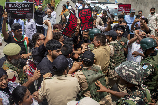 Indian police stop supporters of Indian National Congress (INC) during a protest marking the seventh anniversary of the abrogation of Articles 370 and 35A, which had granted special constitutional status to the former state of Jammu and Kashmir. The provisions were revoked on August 5, 2019, by India's Hindu nationalist Prime Minister Narendra Modi's Bharatiya Janata Party (BJP)-led government, which also reorganized the region into two federally administered union territories. Political parties in Jammu and Kashmir observed the anniversary as "Black Day", staging protests and calling for the restoration of the region's constitutional guarantees and full statehood.