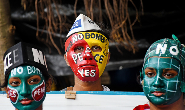 Students with face paintings saying 'No Bomb Peace Yes' and 'No Bomb Yes Peace' take part during Hiroshima day peace march. Hiroshima-Nagasaki Day annual peace rally was organised by students from different colleges of the city to commemorate 81st anniversary of the devastating atomic attacks on Hiroshima and Nagasaki by America during World War II. Students graphically depicted horrors of nuclear war reaffirming their commitment to the ideals of peace, nonviolence, and universal brotherhood.