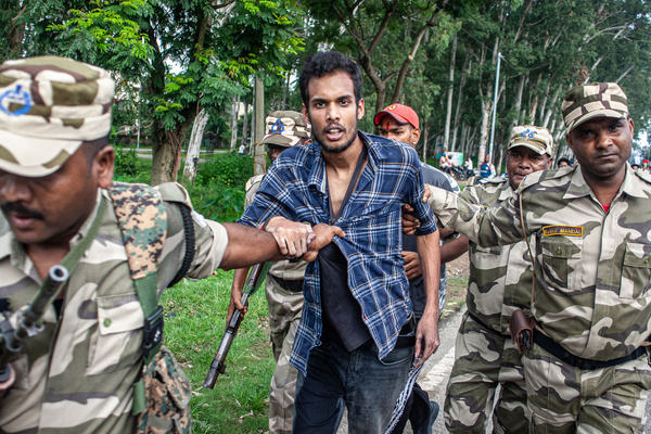 Police officers detain a protester after he threw ink at All India Students' Association (AISA) national president Neha Bora during a demonstration against the Jharkhand Public Service Commission (JPSC) over alleged examination paper leaks and recruitment delays. Job aspirants and student groups stage a demonstration against the Jharkhand Public Service Commission (JPSC). The ongoing agitation has drawn national attention, with protesters and student unions demanding an independent probe into alleged paper leaks, systemic recruitment delays, and administrative irregularities in state civil service examinations.