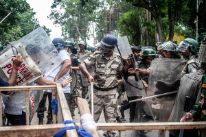 A police officer uses a baton on a protester during the demonstration. Students staged a march to the state assembly, amplifying ongoing protests against alleged irregularities in examinations conducted by the Jharkhand Public Service Commission and the Jharkhand Staff Selection Commission.