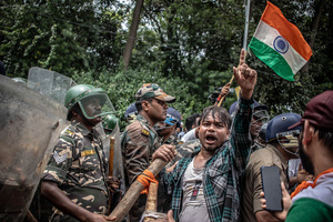 A protester near a barricade shouts during the demonstration. Students staged a march to the state assembly, amplifying ongoing protests against alleged irregularities in examinations conducted by the Jharkhand Public Service Commission and the Jharkhand Staff Selection Commission.