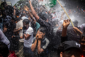 Police use a water cannon on protesting students during a demonstration. Students staged a march to the state assembly, amplifying ongoing protests against alleged irregularities in examinations conducted by the Jharkhand Public Service Commission and the Jharkhand Staff Selection Commission.
