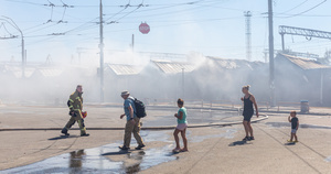 A firefighter and local citizens seen walking past the Smouldering ruins of the Pochayna book market following a devastating overnight Russian military attack. On the night of August 16, 2026, a massive Russian air strike on Kyiv caused severe destruction and a large-scale fire at the "Pochaina" book market (formerly known as Petrivka) in the Obolon district. The enemy attack completely burned down several rows of trading pavilions containing books and stationery just ahead of the new school year. Emergency response teams worked at the scene to extinguish the blaze, which spread across a vast area. According to preliminary reports from city authorities, at least three people were injured as a result of the overnight attack. The destroyed marketplace had operated in the capital for nearly 30 years and stood as one of the largest hubs for book trade in Ukraine.