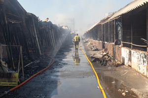 A firefighter seen walking between burned trading stalls at Pochayna book market following a Russian attack. On the night of August 16, 2026, a massive Russian air strike on Kyiv caused severe destruction and a large-scale fire at the "Pochaina" book market (formerly known as Petrivka) in the Obolon district. The enemy attack completely burned down several rows of trading pavilions containing books and stationery just ahead of the new school year. Emergency response teams worked at the scene to extinguish the blaze, which spread across a vast area. According to preliminary reports from city authorities, at least three people were injured as a result of the overnight attack. The destroyed marketplace had operated in the capital for nearly 30 years and stood as one of the largest hubs for book trade in Ukraine.