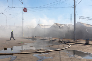 A firefighter seen walking near damaged market buildings following a nighttime Russian attack that caused a massive fire at the Pochayna book market . On the night of August 16, 2026, a massive Russian air strike on Kyiv caused severe destruction and a large-scale fire at the "Pochaina" book market (formerly known as Petrivka) in the Obolon district. The enemy attack completely burned down several rows of trading pavilions containing books and stationery just ahead of the new school year. Emergency response teams worked at the scene to extinguish the blaze, which spread across a vast area. According to preliminary reports from city authorities, at least three people were injured as a result of the overnight attack. The destroyed marketplace had operated in the capital for nearly 30 years and stood as one of the largest hubs for book trade in Ukraine.