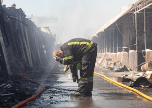 A firefighter seen drinking water from a hose amidst the ruins of the Pochayna book market following a Russian attack . On the night of August 16, 2026, a massive Russian air strike on Kyiv caused severe destruction and a large-scale fire at the "Pochaina" book market (formerly known as Petrivka) in the Obolon district. The enemy attack completely burned down several rows of trading pavilions containing books and stationery just ahead of the new school year. Emergency response teams worked at the scene to extinguish the blaze, which spread across a vast area. According to preliminary reports from city authorities, at least three people were injured as a result of the overnight attack. The destroyed marketplace had operated in the capital for nearly 30 years and stood as one of the largest hubs for book trade in Ukraine.