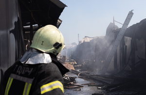 A firefighter seen surveying destruction following a destructive Russian missile attack on the historic pochaina book market . On the night of August 16, 2026, a massive Russian air strike on Kyiv caused severe destruction and a large-scale fire at the "Pochaina" book market (formerly known as Petrivka) in the Obolon district. The enemy attack completely burned down several rows of trading pavilions containing books and stationery just ahead of the new school year. Emergency response teams worked at the scene to extinguish the blaze, which spread across a vast area. According to preliminary reports from city authorities, at least three people were injured as a result of the overnight attack. The destroyed marketplace had operated in the capital for nearly 30 years and stood as one of the largest hubs for book trade in Ukraine.