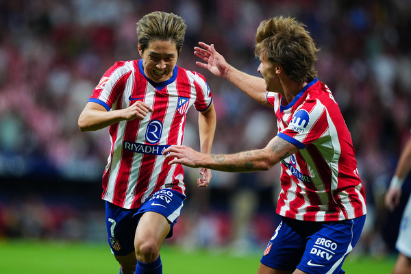 Lee Kang-In and Pablo Barrios of Atletico Madrid seen celebrating during the LaLiga EA Sports match between Atletico Madrid and Malaga CF at Metropolitano Stadium . Final Score; Atletico Madrid 2:0 Malaga CF.
