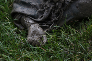 (EDITOR'S NOTE: Image depicts death)
The corpse of a woman is seen on the ground after it was recovered, following a massive flash flood triggered by an avalanche of ice and rock in the upper Lhende River on the Tibetan side. The sudden flood swept through communities along the Bhote Koshi and Trishuli river, destroying homes, roads and bridges and leaving a widespread devastation downstream.