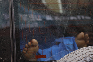 An injured person is pictured inside an ambulance after buildings and infrastructure were damaged along the swollen Trishuli River following a massive flash flood triggered by an avalanche of ice and rock in the upper Lhende River on the Tibetan side. The sudden flood swept through communities along the Bhote Koshi and Trishuli river, destroying homes, roads and bridges and leaving a widespread devastation downstream.