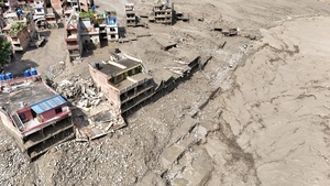 (EDITOR'S NOTE : Image taken with a drone).
An aerial view shows buildings and infrastructure damaged along the swollen Trishuli River following a massive flash flood triggered by an avalanche of ice and rock in the upper Lhende River on the Tibetan side. The sudden flood swept through communities along the Bhote Koshi and Trishuli river, destroying homes, roads and bridges and leaving a widespread devastation downstream.