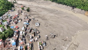 (EDITOR'S NOTE : Image taken with a drone).
An aerial view shows buildings and infrastructure damaged along the swollen Trishuli River following a massive flash flood triggered by an avalanche of ice and rock in the upper Lhende River on the Tibetan side. The sudden flood swept through communities along the Bhote Koshi and Trishuli river, destroying homes, roads and bridges and leaving a widespread devastation downstream.