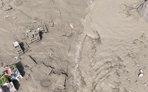 (EDITOR'S NOTE : Image taken with a drone).
An aerial view shows buildings and infrastructure damaged along the swollen Trishuli River following a massive flash flood triggered by an avalanche of ice and rock in the upper Lhende River on the Tibetan side. The sudden flood swept through communities along the Bhote Koshi and Trishuli river, destroying homes, roads and bridges and leaving a widespread devastation downstream.