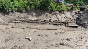 (EDITOR'S NOTE : Image taken with a drone).
An aerial view shows buildings and infrastructure damaged along the swollen Trishuli River following a massive flash flood triggered by an avalanche of ice and rock in the upper Lhende River on the Tibetan side. The sudden flood swept through communities along the Bhote Koshi and Trishuli river, destroying homes, roads and bridges and leaving a widespread devastation downstream.