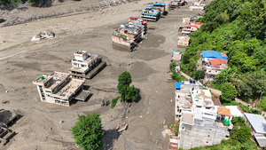 (EDITOR'S NOTE : Image taken with a drone).
An aerial view shows buildings and infrastructure damaged along the swollen Trishuli River following a massive flash flood triggered by an avalanche of ice and rock in the upper Lhende River on the Tibetan side. The sudden flood swept through communities along the Bhote Koshi and Trishuli river, destroying homes, roads and bridges and leaving a widespread devastation downstream.