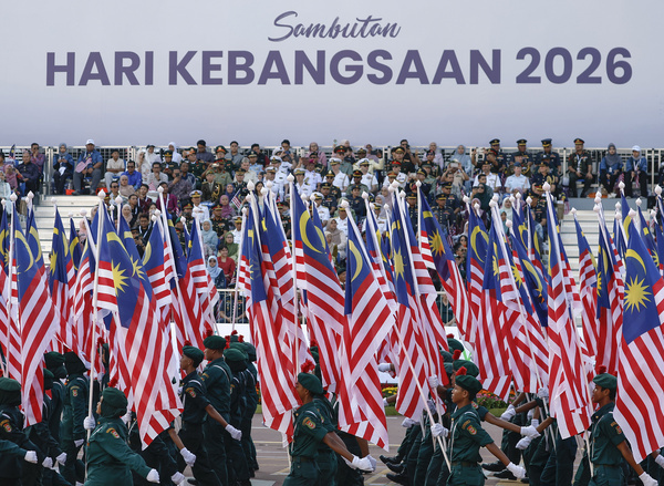 Malaysian students hold national flags during the 69th National Day celebrations parade in Putrajaya. Hari Merdeka (Independence Day) is the national day of Malaysia. It commemorates the independence of the Federation of Malaya from the British colonial rule on August 31st, 1957.