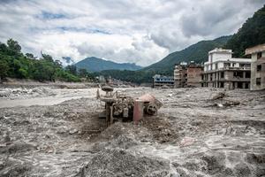Nuwakot district is almost entirely cut off and paralyzed after catastrophic flash floods, triggered by upstream glacier collapse, annihilated infrastructure, including this crucial asphalt road section, in Trishuli. The widespread erosion and massive surge of mud have fundamentally altered the landscape and severed critical connectivity, isolating survivors across the devastated district and making a mockery of any recovery timeline as thousands face displacement.
