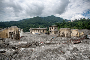 Nuwakot district is almost entirely cut off and paralyzed after catastrophic flash floods, triggered by upstream glacier collapse, annihilated infrastructure, including this crucial asphalt road section, in Trishuli. The widespread erosion and massive surge of mud have fundamentally altered the landscape and severed critical connectivity, isolating survivors across the devastated district and making a mockery of any recovery timeline as thousands face displacement.