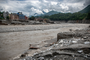 Nuwakot district is almost entirely cut off and paralyzed after catastrophic flash floods, triggered by upstream glacier collapse, annihilated infrastructure, including this crucial asphalt road section, in Trishuli. The widespread erosion and massive surge of mud have fundamentally altered the landscape and severed critical connectivity, isolating survivors across the devastated district and making a mockery of any recovery timeline as thousands face displacement.