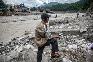 Nuwakot district is almost entirely cut off and paralyzed after catastrophic flash floods, triggered by upstream glacier collapse, annihilated infrastructure, including this crucial asphalt road section, in Trishuli. The widespread erosion and massive surge of mud have fundamentally altered the landscape and severed critical connectivity, isolating survivors across the devastated district and making a mockery of any recovery timeline as thousands face displacement.