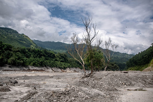 Nuwakot district is almost entirely cut off and paralyzed after catastrophic flash floods, triggered by upstream glacier collapse, annihilated infrastructure, including this crucial asphalt road section, in Trishuli. The widespread erosion and massive surge of mud have fundamentally altered the landscape and severed critical connectivity, isolating survivors across the devastated district and making a mockery of any recovery timeline as thousands face displacement.