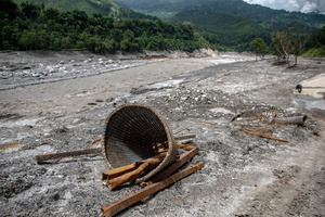 Nuwakot district is almost entirely cut off and paralyzed after catastrophic flash floods, triggered by upstream glacier collapse, annihilated infrastructure, including this crucial asphalt road section, in Trishuli. The widespread erosion and massive surge of mud have fundamentally altered the landscape and severed critical connectivity, isolating survivors across the devastated district and making a mockery of any recovery timeline as thousands face displacement.
