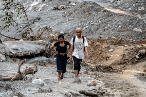 Nuwakot district is almost entirely cut off and paralyzed after catastrophic flash floods, triggered by upstream glacier collapse, annihilated infrastructure, including this crucial asphalt road section, in Trishuli. The widespread erosion and massive surge of mud have fundamentally altered the landscape and severed critical connectivity, isolating survivors across the devastated district and making a mockery of any recovery timeline as thousands face displacement.