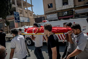 (EDITORS NOTE: Image depicts death)
Mourners carry the body of a child in Kfar Roummane, southern Lebanon, during the funeral of a family killed by an Israeli airstrike. At least 4,381 people were killed and 12,402 wounded by Israeli attacks in Lebanon between March 2 and September 7, 2026, according to Lebanon's ministry of health.