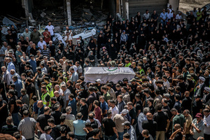 Mourners carry coffins in Kfar Roummane, southern Lebanon, during the funeral of a family killed by an Israeli airstrike. At least 4,381 people were killed and 12,402 wounded by Israeli attacks in Lebanon between March 2 and September 7, 2026, according to Lebanon's ministry of health.