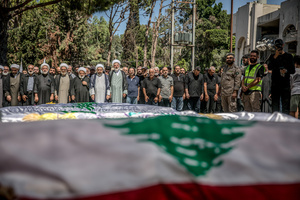 Mourners pray in Kfar Roummane, southern Lebanon, during the funeral of a family killed by an Israeli airstrike. At least 4,381 people were killed and 12,402 wounded by Israeli attacks in Lebanon between March 2 and September 7, 2026, according to Lebanon's ministry of health.